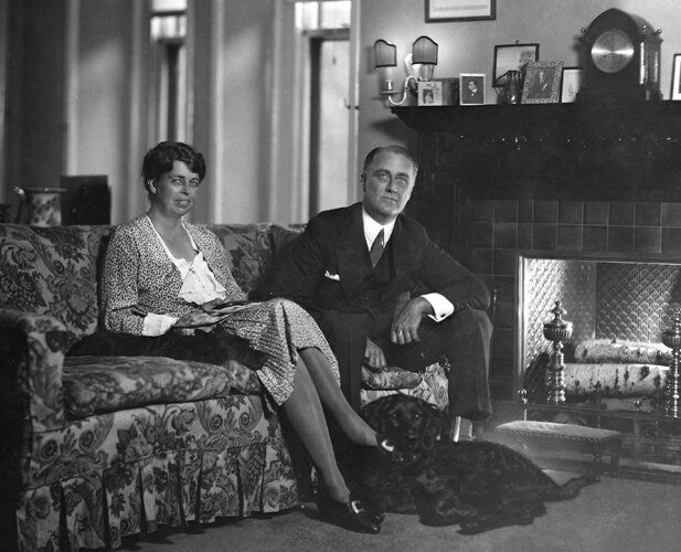 NY Gov. Franklin Roosevelt sitting beside wife Eleanor w. their dog at their feet in Executive Mansion. New York, 1929. (Photo by Bachrach/Getty Images)